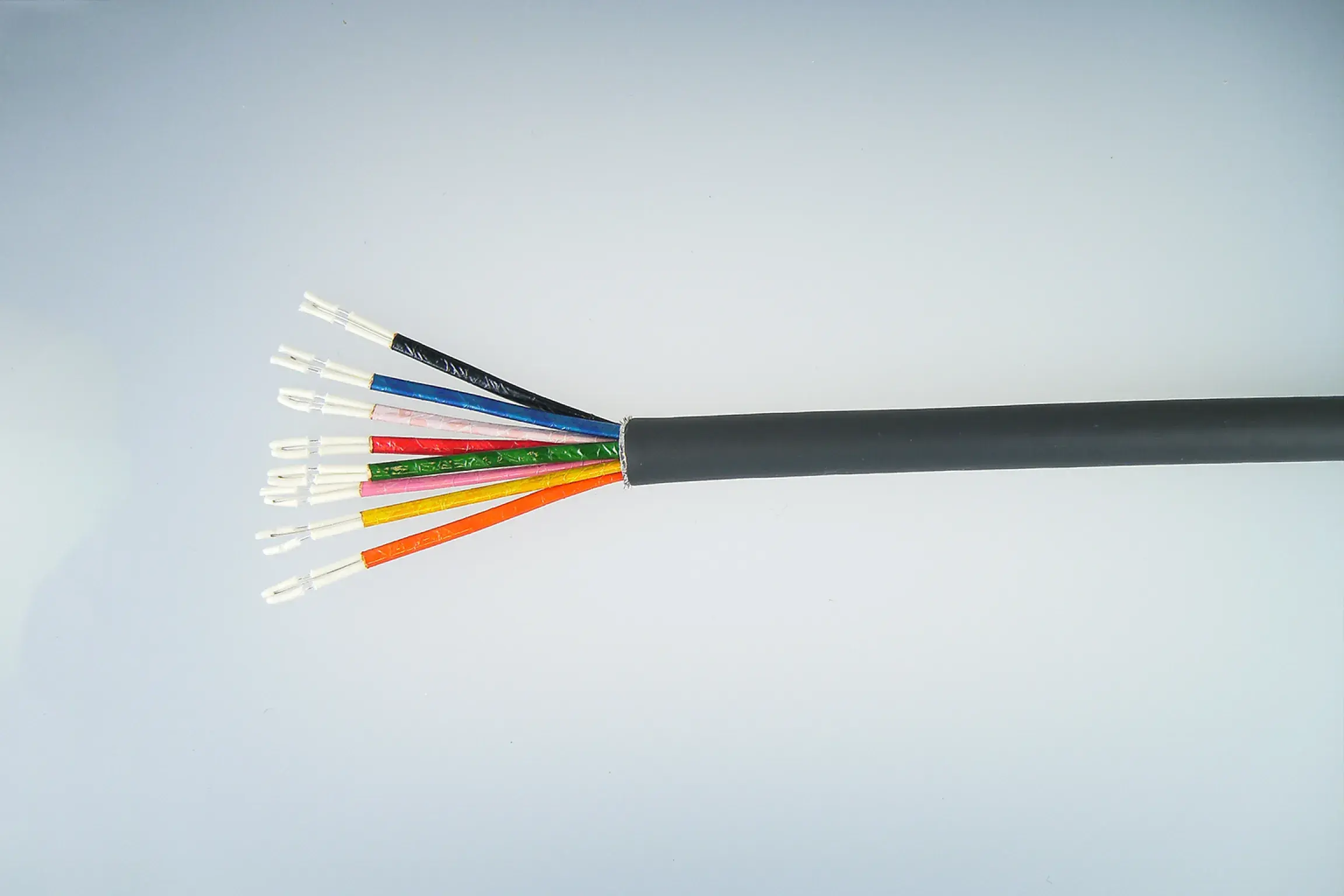 Multicolor wires inside one wrapper of black color.